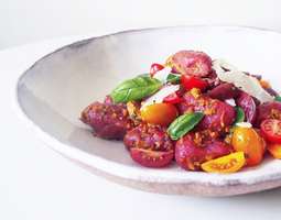 Beetroot gnocchi with red pepper and walnut pesto